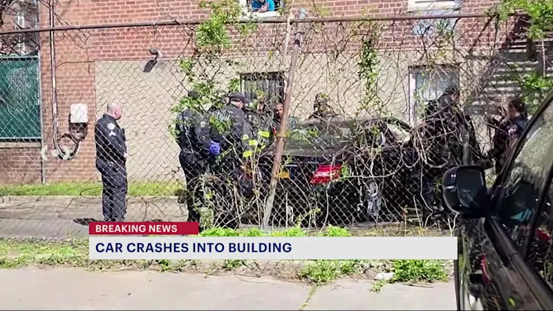 Story image: Woman drives car into fence at Sheepshead Bay IHOP