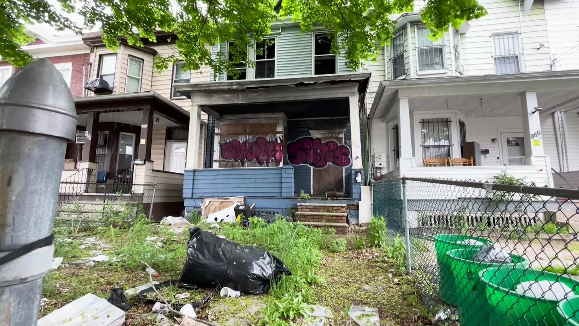 Paterson resident voices concerns about health and safety risks from abandoned home near his property