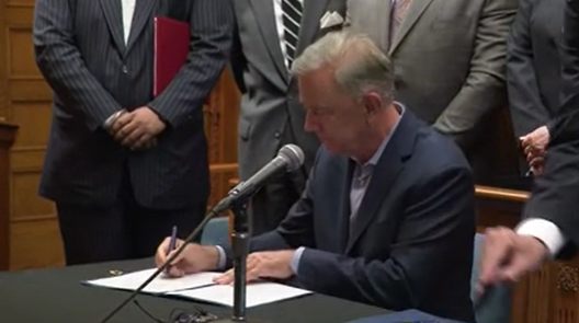 Lamont Bill Signing