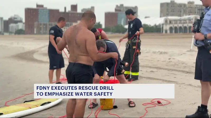 Story image: FDNY practices ocean rescues amid summer swim surge