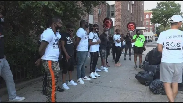 ‘Save our Streets’ members gather to denounce gun violence after shooting in Bed-Stuy