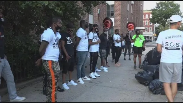 ‘Save our Streets’ members gather to denounce gun violence after shooting in Bed-Stuy