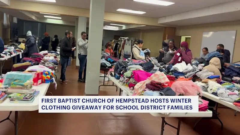 Story image: Hempstead church, schools host winter clothing giveaway