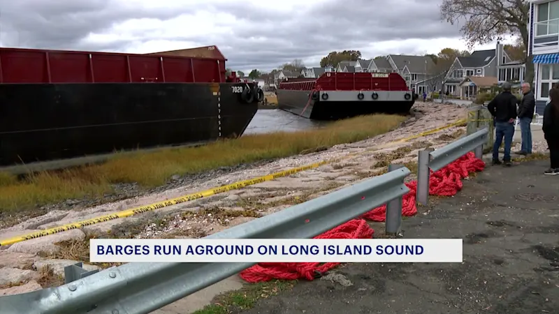 Story image: Barges that washed ashore in Milford drift toward West Haven