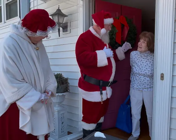 Story image: ‘Santa’ and ‘Mrs. Claus’ join volunteers to deliver meals for seniors in Newburgh