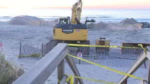 Officials work on beach replenishment at Sea Girt where toddler got trapped in sand