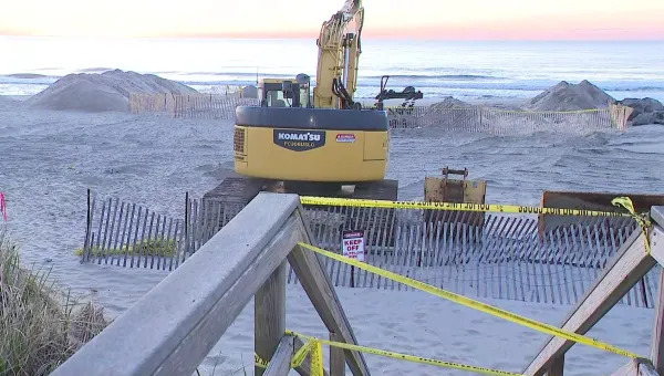 Officials work on beach replenishment at Sea Girt where toddler got trapped in sand