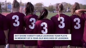 Bay Shore HS varsity girl's lacrosse team 'Play For Pearl' in memory of 9-year-old