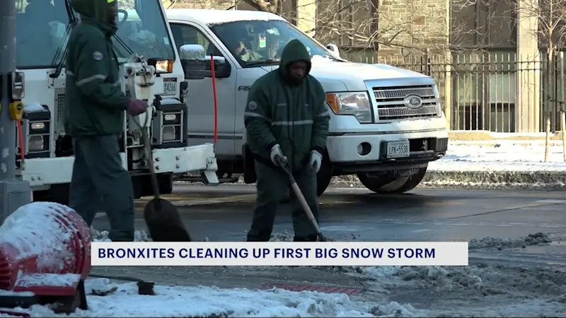 Story image: Sanitation crews clear snow, salt walkways amid deep freeze