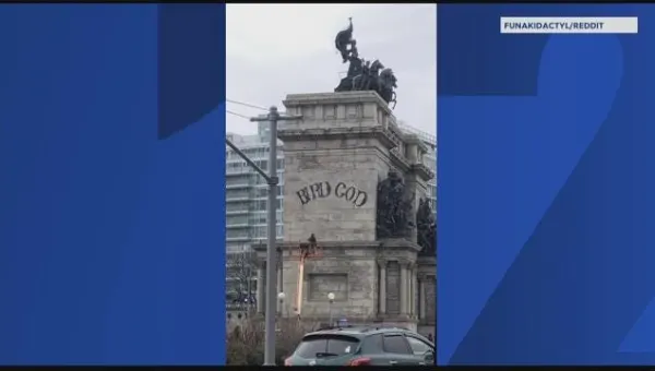 Man on stolen cherry picker sprays 'Bird God' on iconic Brooklyn arch