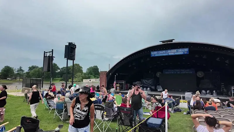 Story image: Stormy start, country finale: Cole Swindell fans ride out wild weather at Eisenhower Park