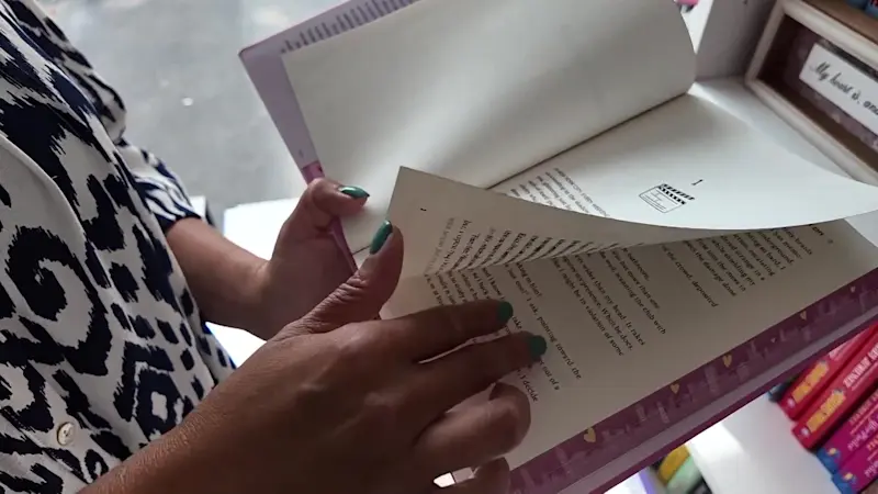 Story image: Sewanhaka Central School District teacher opens The Wandering Page pop-up mobile book shop