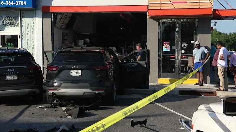 Story image: Car crashes through front of Dunkin' Donuts in Syosset