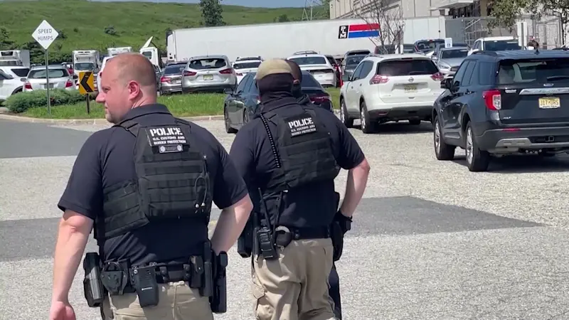 Story image: ICE raid at Avenel warehouse leads to 46 arrests