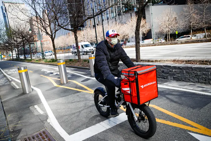 Story image: DoorDash to pay NY delivery workers $17 million for using their tips to cover wages