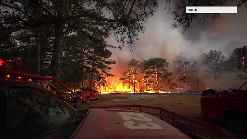 Story image: Wildfire consumes 160 acres of land in West Milford