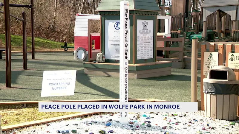 Story image: ‘May peace prevail on Earth.’ Peace pole installed in Monroe park