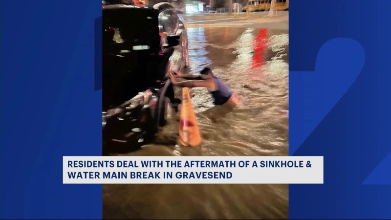 Story image: Water main break in Gravesend causes large sink hole; Jeep nearly swallowed