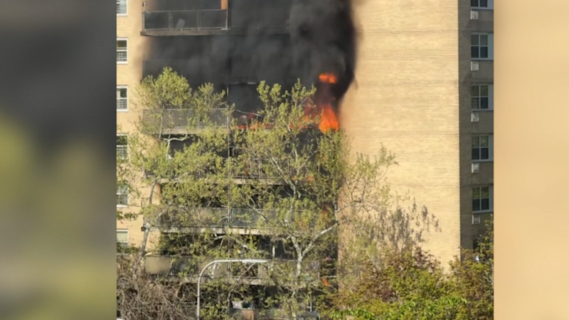 Story image: Five-alarm fire tears through Yonkers high-rise, residents displaced and firefighter hurt