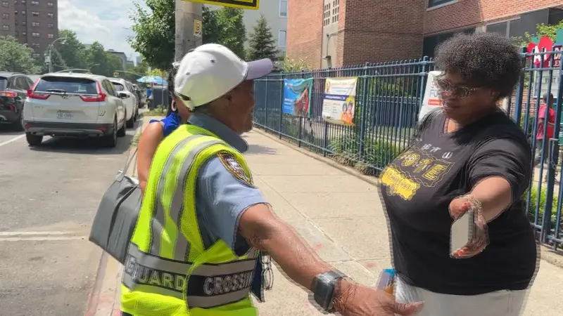 Story image: A local school crossing guard takes her final steps after 47 years 