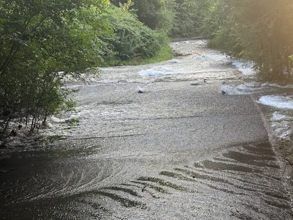 Story image: Paterson residents line up for water after main break leaves taps dry
