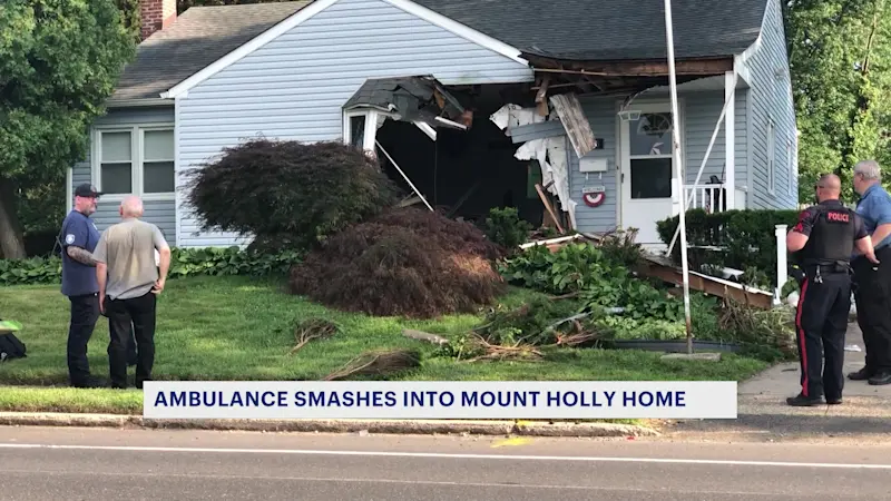 Story image: Police: 3 hurt when ambulance crashes into Mount Holly home