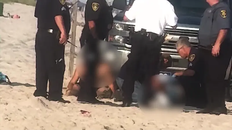 Story image: Man arrested for stabbing 17-year-old at Smith Point Beach