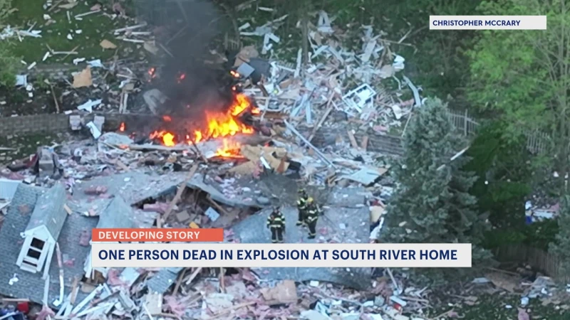Story image: Aftermath of deadly house explosion in South River shows home blown into pieces