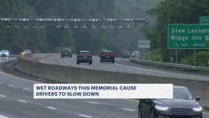 Memorial Day weekend motorists cautiously drive through stormy weather to return home