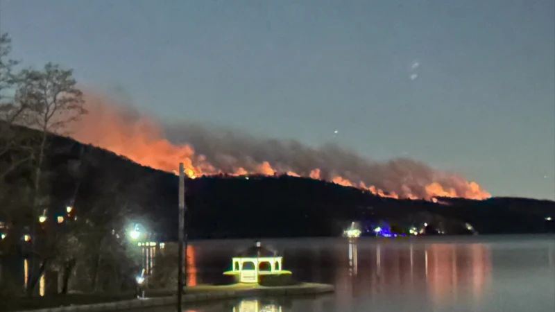 Story image: Smoke covers Greenwood Lake as firefighters 'fight fire with fire'