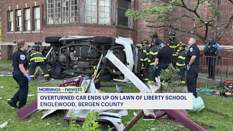 Story image: Crash sends SUV onto lawn of vacant Englewood school