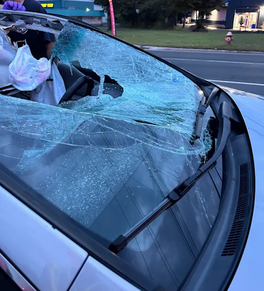 Tire smashes windshield