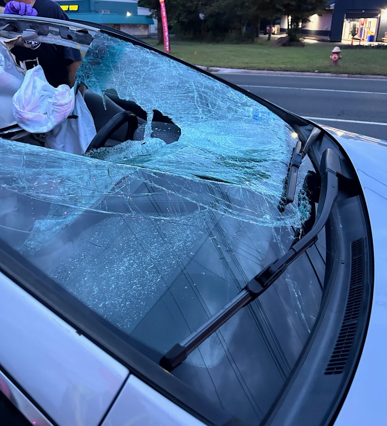 Tire smashes windshield