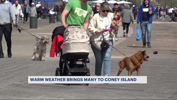 Brooklyn residents enjoy beautiful day at Coney Island boardwalk 