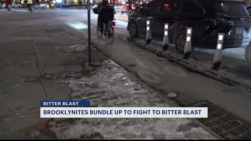 Story image: Brooklyn residents bundle up to beat the bitter blast