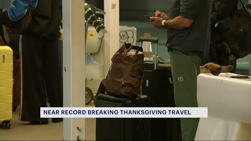 Story image: Travelers beat the holiday rush at JFK