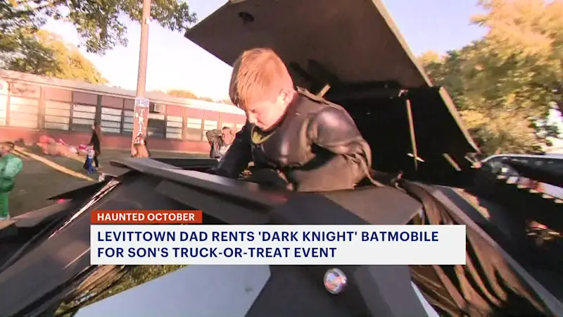 Story image: Batmobile lights up Levittown Trunk or Treat event
