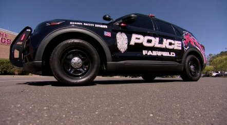 Story image: Fairfield SROs show off school spirit with new police cars
