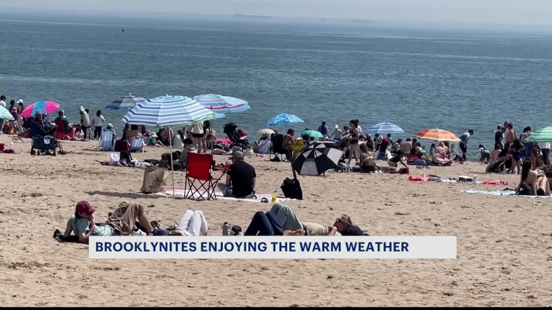 Story image: Brooklyn residents flock to Coney Island to enjoy hot weather 
