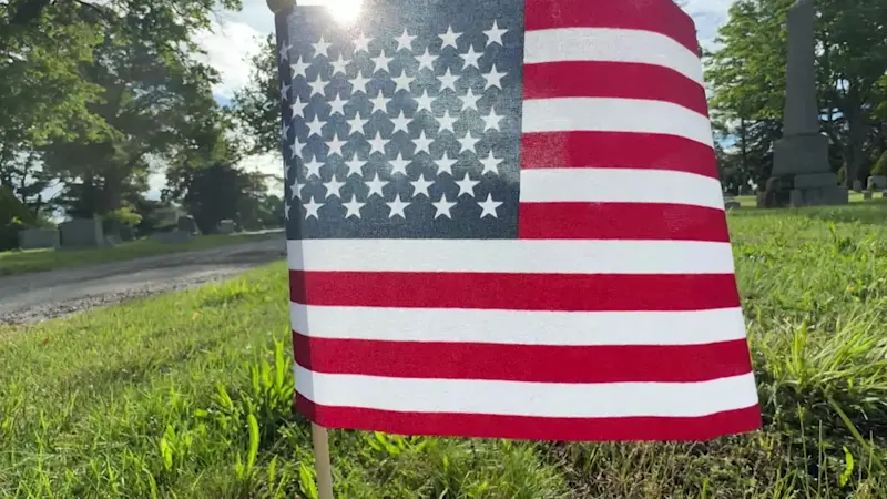 Story image: Bridgeport veterans place flags on graves of American heroes
