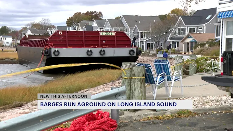 Story image: Barges that washed ashore in Milford drifting toward West Haven