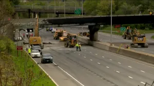 Bridge over section of I-95 in process of being demolished due to damage from truck fire