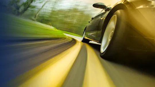 car driving on road 