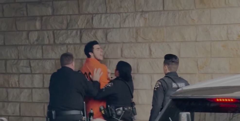 Suspect in the killing of UnitedHealthcare’s CEO struggles, shouts while entering courthouse