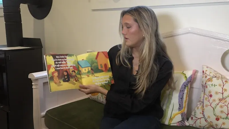 Story image: 'You belong.' Westport student pens children's book to benefit refuge families