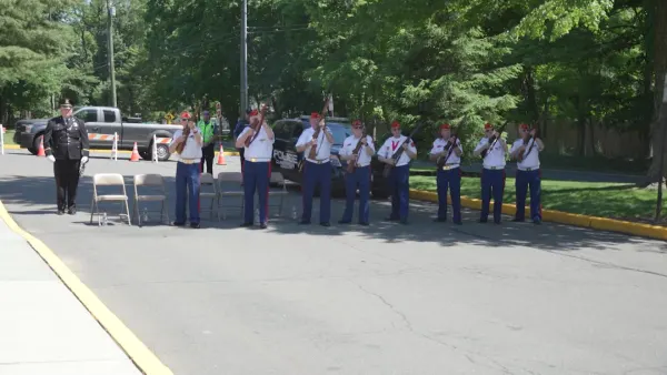 Dozens attend a Memorial Day ceremony in Rockland on Friday