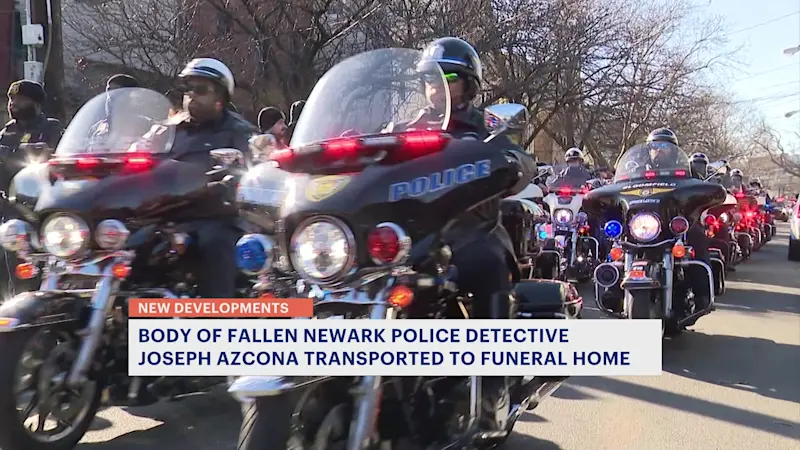 Story image: Hundreds honor fallen Newark detective at procession