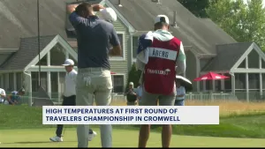 'You sweat just standing still.' Fans battle hot temps during 1st round of PGA Tour Travelers Championship in Cromwell