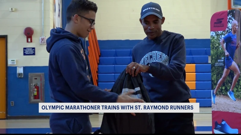 Story image: St. Raymond’s High School track & field gifted brand-new kicks from marathon legend 