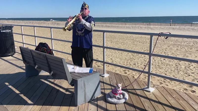 Story image: Navy vet plays sax alongside his singing dog to entertain people along Asbury Park boardwalk 